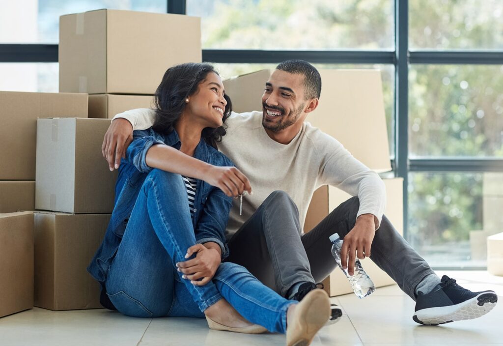 couple smiles because their move was made easy with labor-only movers